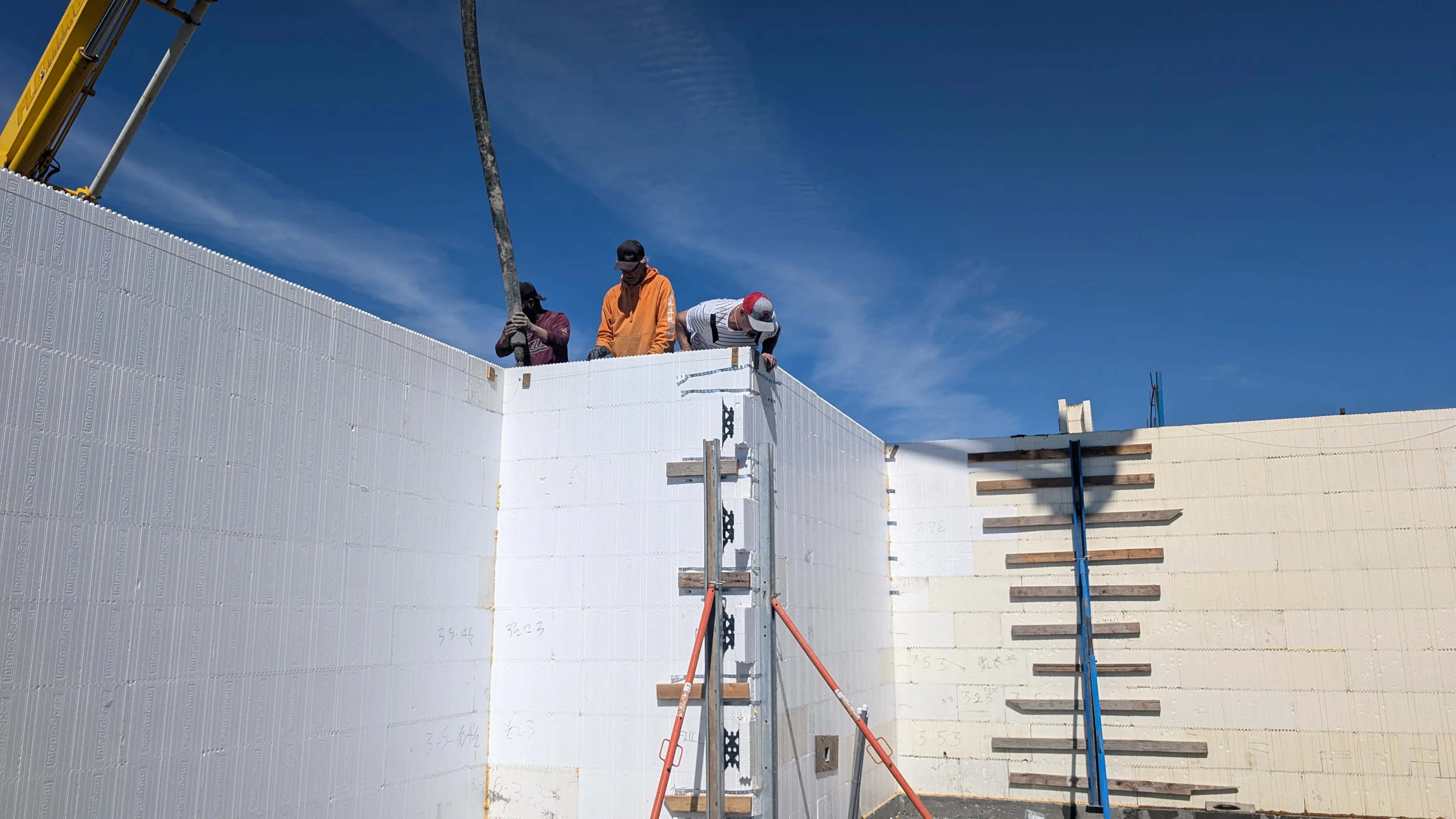 Formix Construction reviewing ICF wall installation on site